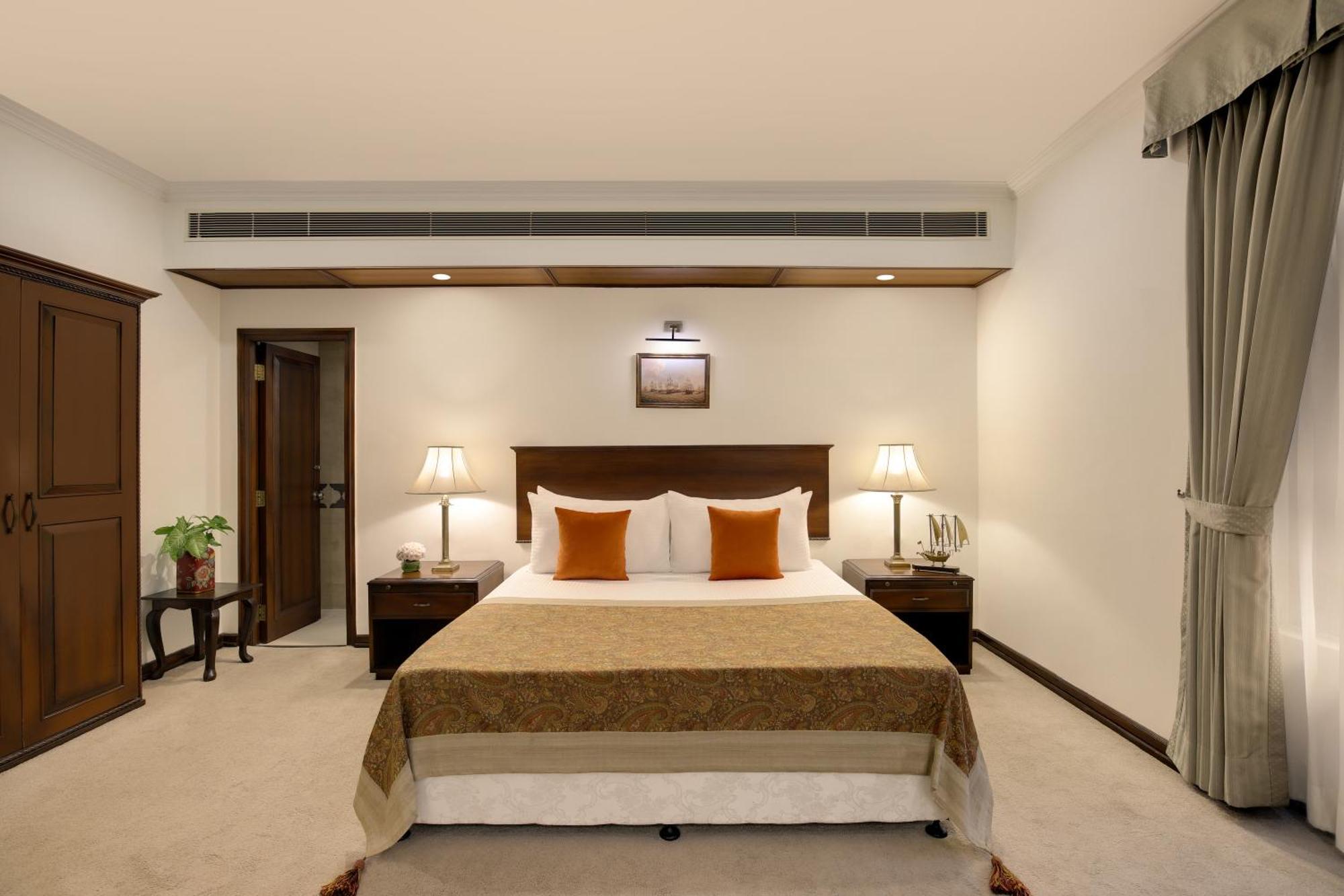 Ambassador, New Delhi - Ihcl Seleqtions Otel Dış mekan fotoğraf A bedroom at the Taj Bengal